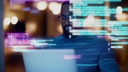 Focused man programming on laptop. Developer coding script with data overlay. Cybersecurity, digital technology, and software engineering concept. Footage. - Powered by Adobe