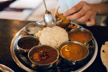 Indian Cuisine Thali with Rice, Dal and Curry