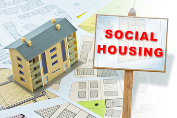 SOCIAL HOUSING AND HOMEOWNERS ASSOCIATION CONCEPT WITH SIGN AND APARTMENT BUILDING MODEL -...