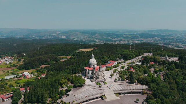 aerial shot of sameiro sanctuary dome and square in braga portugal
