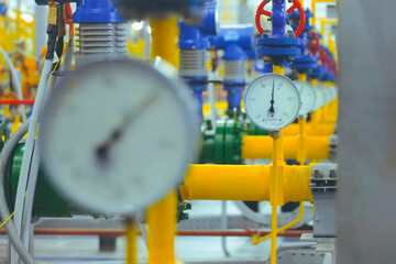 Pressure gauges on the gas pipeline in gas metering room at the LNG plant