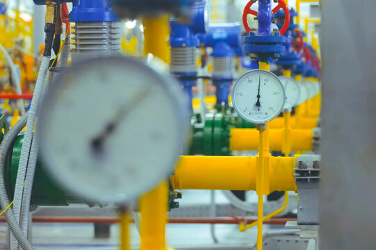 Pressure gauges on the gas pipeline in gas metering room at the LNG plant