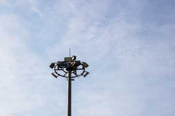 A Modern Surveillance Light Pole Set Against a Clear Blue Sky
