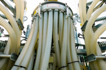 plastic hoses for pumping liquids on farm.