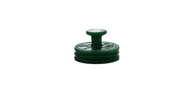 Vintage green wax seal stamp with intricate details and classic design, isolated on a transparent background for craft concepts.