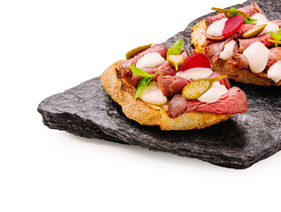 Delicious roast beef sandwiches served on crusty bread with fresh toppings