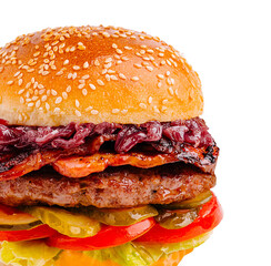 Juicy hamburger with toppings served on sesame seed bun ready to eat