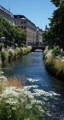 Obraz premium Canal with buildings, greenery, and bridge