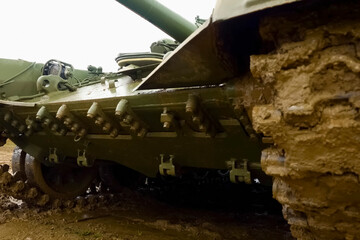 T-72 tank tracks testing in muddy weather at proving ground. © Olga