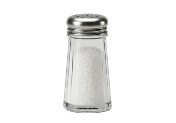 Isolated full clear glass salt shaker with a stainless steel cap and perforated top, food photography