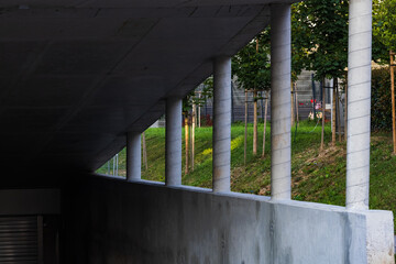 concrete underpass garage doors structure with cylindrical columns