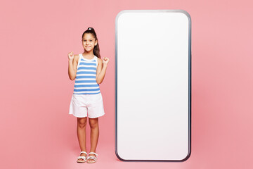 Traveler winner kid child in casual clothes big huge blank screen mobile cell phone isolated on...