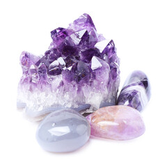 Many different healing stones isolated on white