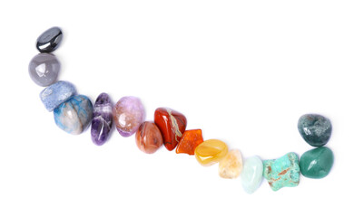 Many different healing stones isolated on white, top view