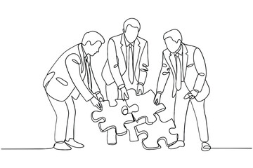 Business team collaborating to solve a puzzle together