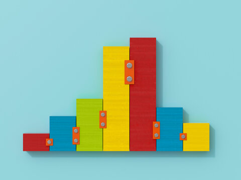 Colorful 3d wooden blocks forming a bar chart symbolizing finance and teamwork