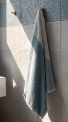 cotton towel hanging in bathroom