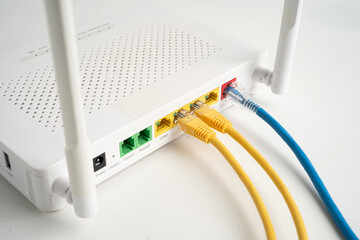 Ethernet cable with wireless router connect to internet service provider network.