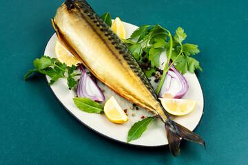 Hot-smoked headless mackerel.