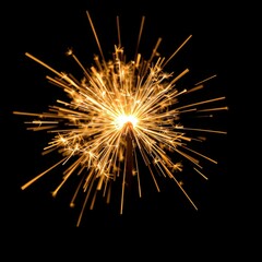 Fototapeta premium Sparkler creating bright golden sparks on a dark background for Diwali 