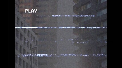 Animation of interference and play text over cityscape - Powered by Adobe