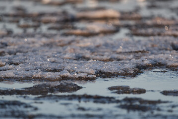 WINTER ON THE SEA COAST - Seawater and ice on the shoreline