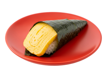 A savory tamagoyaki, a Japanese omelet, is artfully wrapped in nori seaweed, creating a delightful appetizer on a crimson plate.