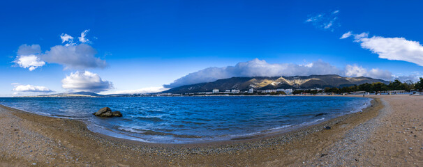 Gelendzhik resort in winter. Nord-Ost wind begins. Signs of storm - clouds over Caucasus Mountains