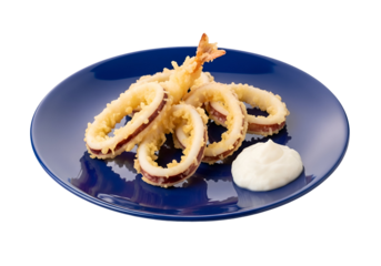 Crispy tempura squid rings on a blue plate with a dollop of creamy sauce, a delicious seafood dish.