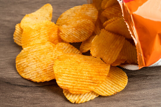 Potato chips , delicious BBQ seasoning spicy for crips, thin slice deep fried snack fast food.