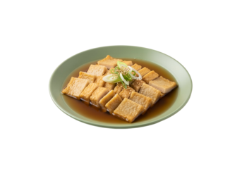 A plate of savory, golden-brown fish cakes, glistening with a dark brown sauce, arranged neatly in a light green plate.