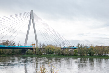 Cable-stayed bridge spanning the river Rhine near to Neuwied under cloudy sky