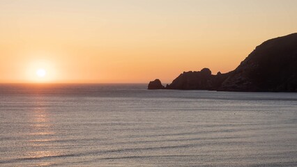 Finisterre Sunset in Galicia, Spain. Mar de Fora beach and Nave cape in Costa da Morte. This is the final step in the Camino de Santiago.