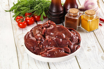 Raw chicken liver uncooked in the bowl