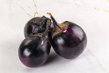 Raw violet and black eggplant