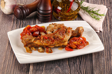 Baked lamb ribs with vegetables