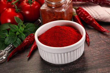 Spicy dry paprika powder in the bowl