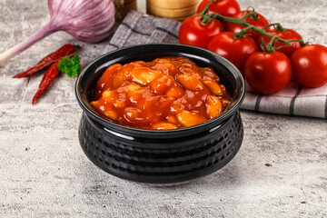 Baked kidney with tomato sauce
