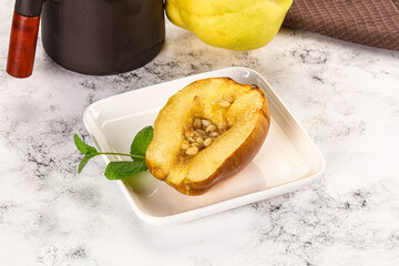 Baked quince with honey and cedar