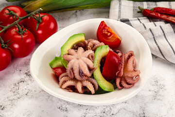 Salad with baby octopus and avocado