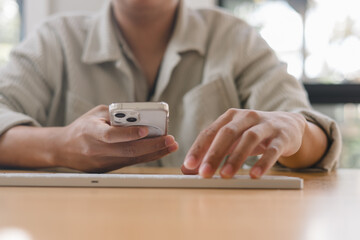 man using smartphone, symbolizing mobile lifestyle, online communication, social media, digital technology, and internet connectivity for modern business, finance and daily life.