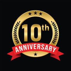 Fototapeta premium Elegant 10th Anniversary Celebration Badge with Gold Wreath and Red Ribbon on Black Background