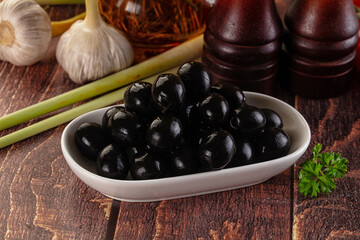 Mediterranean marinated Black olives in the bowl