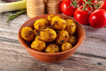 Baked small baby potato with herbs