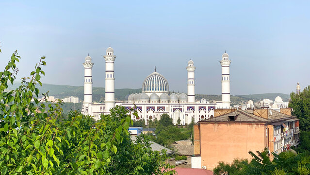 The Central Cathedral Mosque of Dushanbe. Travel and tourism in Tajikistan. A large white Muslim building with a dome