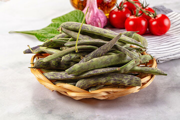 Raw green bean strips heap