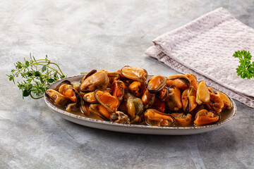 Peeled mussels heap in the bowl