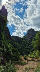 mountain landscape with blue sky and clouds