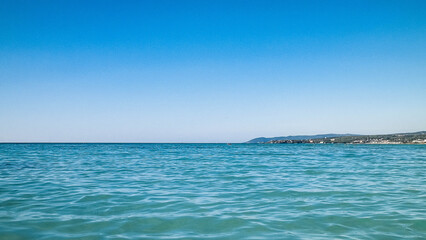 Obraz premium Blue water of Tyrrhenian sea in Vada, Tuscany, Italy.