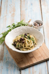spaghetti with anchovy capers  black olives and parsley